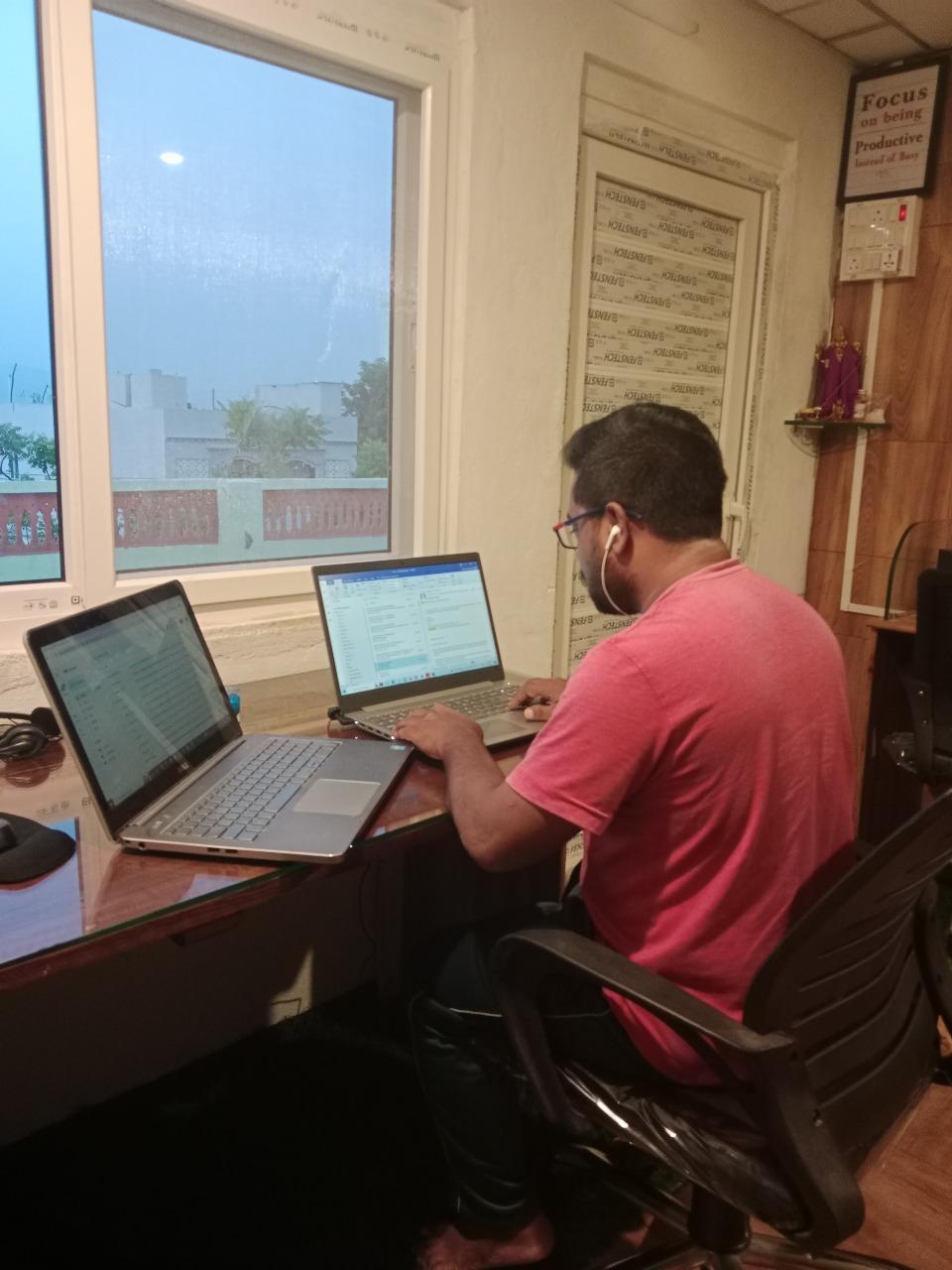 Individual workspace with laptops